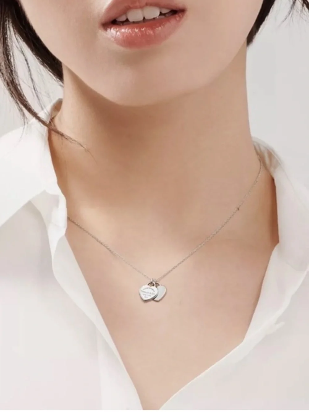 Tiffany & Co. Sterling Silver Double Heart Necklace on Blue Pouch